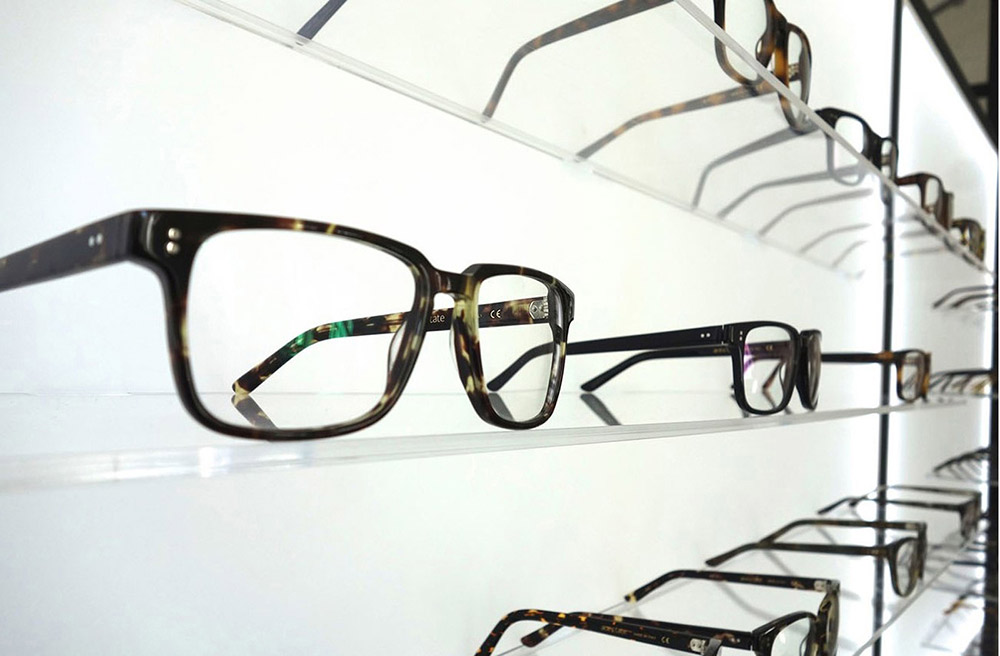 Eyeglasses on shelf